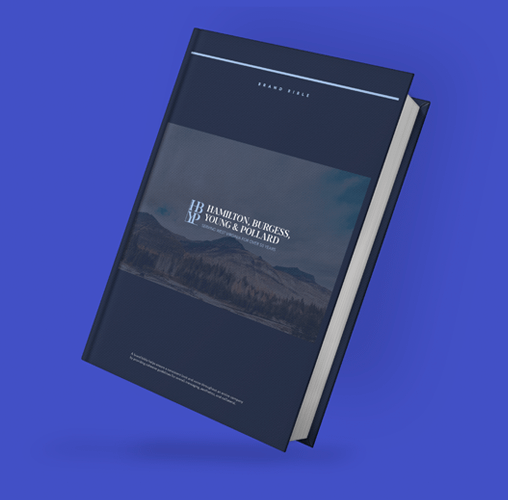 A dark blue hardcover book with Hamilton, Burgess, Young & Pollard printed on the cover over a landscape image of mountains and trees, reminiscent of classic law firm web design, displayed against a solid blue background.